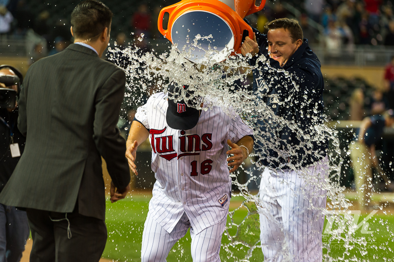 Minnesota Twins right fielder Josh Willingham has Gatorade dumped on him by teammate Matt Capps after Willingham hit a 3-run walk-off home run with 2 outs and down by 2 runs against the Oakland Athletics on May 29, 2012 at Target Field in Minneapolis, Minnesota.  The Twins defeated the Athletics 3 to 2.  Photo: © Ben Krause 2012