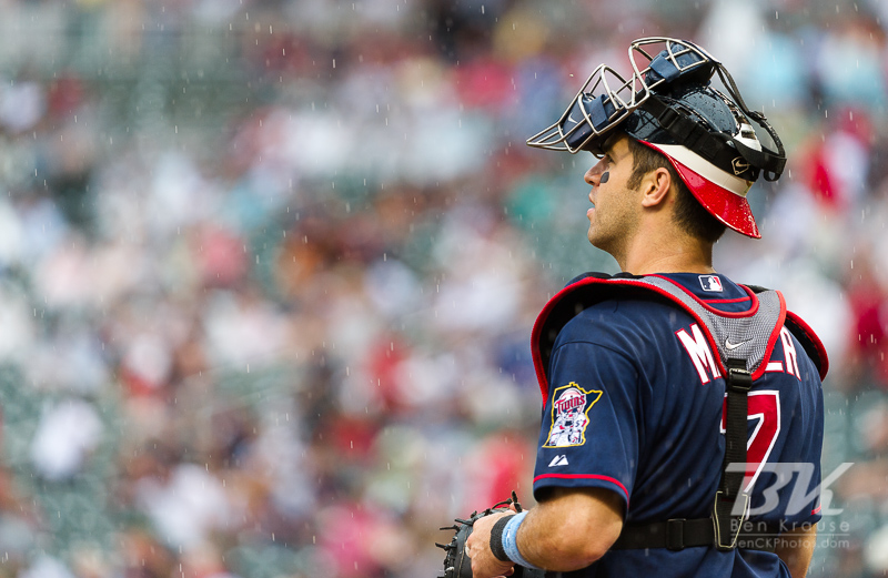 Minnesota Twins catcher Joe Mauer looks on during a game against the Milwaukee Brewers at Target Field in Minneapolis, Minnesota on June 17, 2012.  The Twins defeated the Brewers 5 to 4 in 15 innings.  The game was the longest in Target Field history.  Photo: © Ben Krause 2012