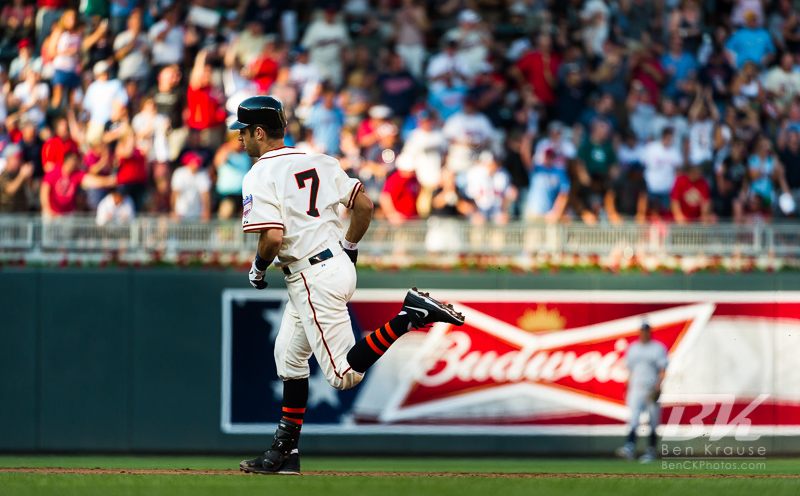 Wearing the 1951 uniform of the Minneapolis Millers,  Minnesota Twins catcher Joe Mauer rounds the bases after hitting a home run against the Kansas City Royals at Target Field on June 30, 2012 in Minneapolis, Minnesota.  This was the second game of a split double header.  The Twins defeated the Royals 5 to 1. Photo: © Ben Krause 2012